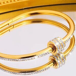 18K GOLD FILL AND HIGH END CUBIC ZIRCONIA TWIST OPEN OVAL BRACELET